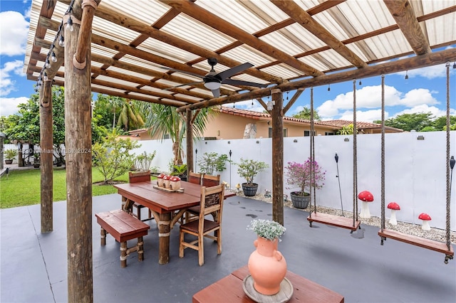 view of patio / terrace with a pergola and ceiling fan