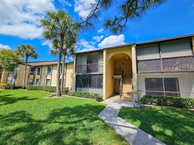 814 Sky Pine Way Unit C1, Green Acres, FL 33415 - view of property with stairs