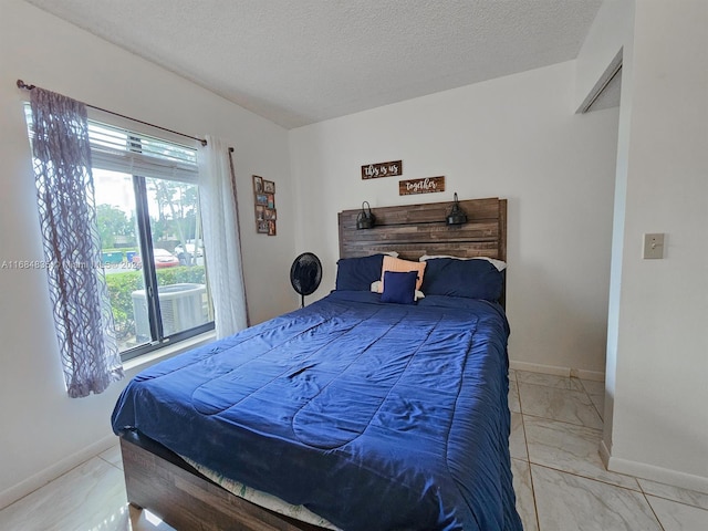 bedroom with a textured ceiling