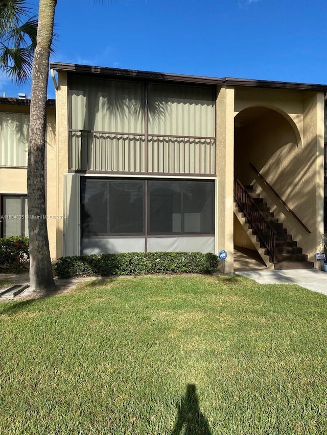 exterior space with a lawn