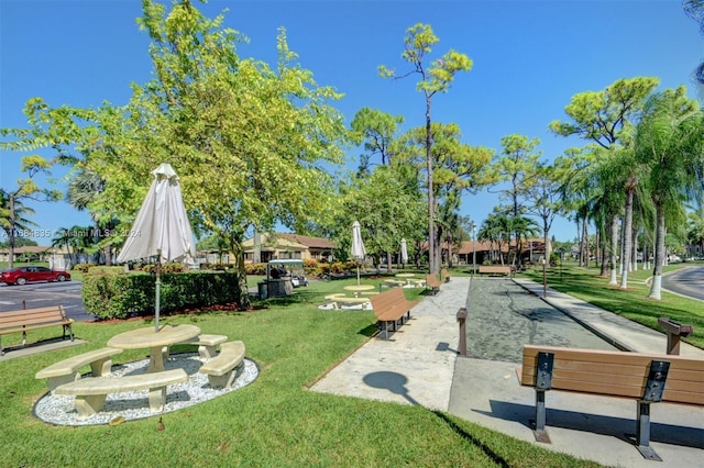 814 Sky Pine Way Unit C1, Green Acres, FL 33415 - view of home's community featuring a lawn