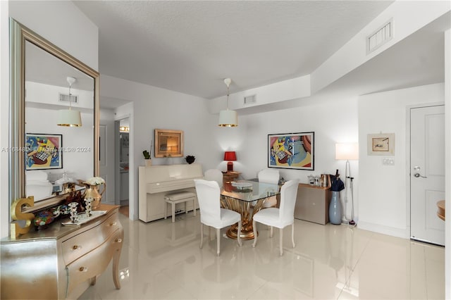 7900 Harbor Island Dr Unit 1223, North Bay Village, FL 33141 - dining space featuring tile patterned floors and a textured ceiling