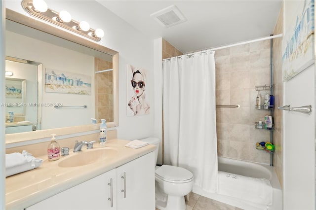 full bathroom with vanity, toilet, shower / bathtub combination with curtain, and tile patterned floors