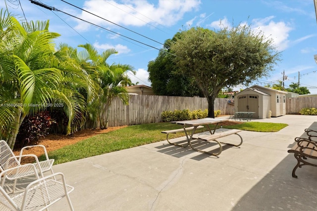 view of patio / terrace with a storage shed