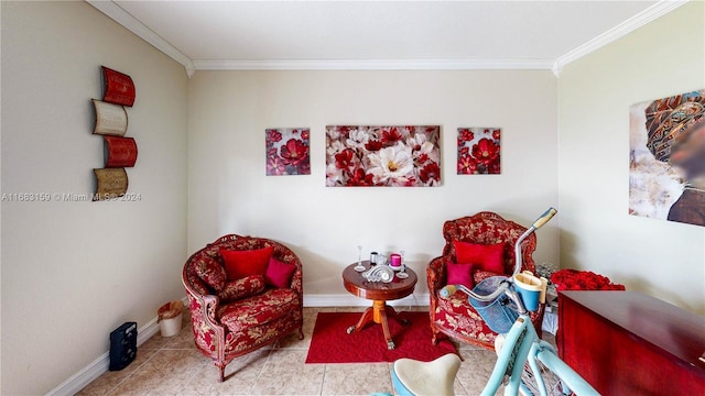 sitting room featuring light tile patterned floors and crown molding