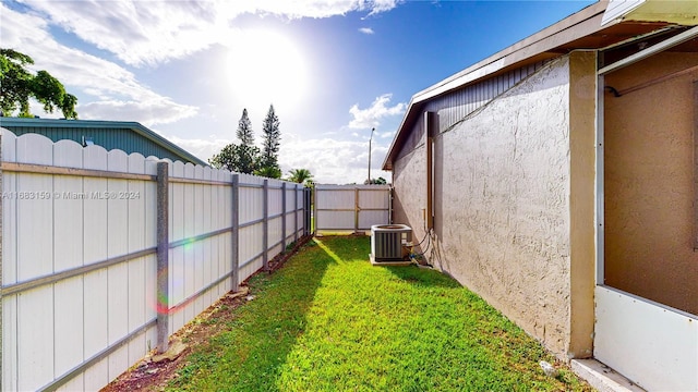 view of yard featuring central AC