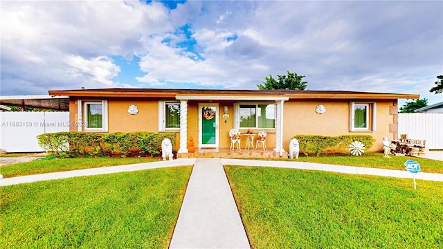 view of front of property with a front lawn