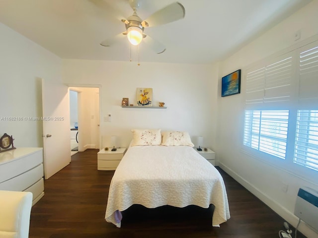 bedroom featuring wood finished floors, a ceiling fan, and baseboards