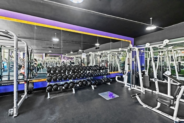 workout area with ceiling fan