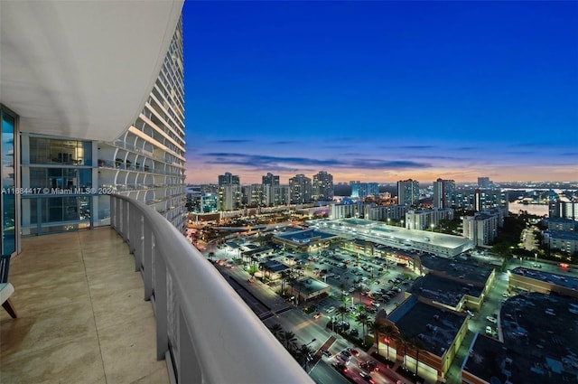 view of balcony at dusk