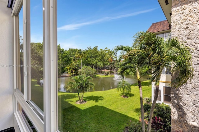 view of yard with a water view