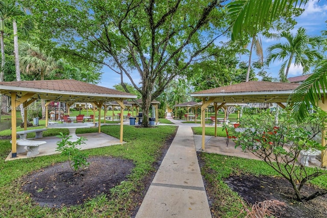 view of home's community featuring a gazebo and a yard