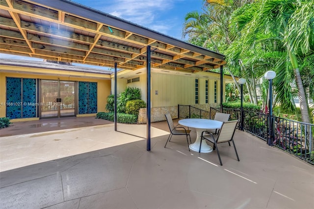 view of patio featuring french doors