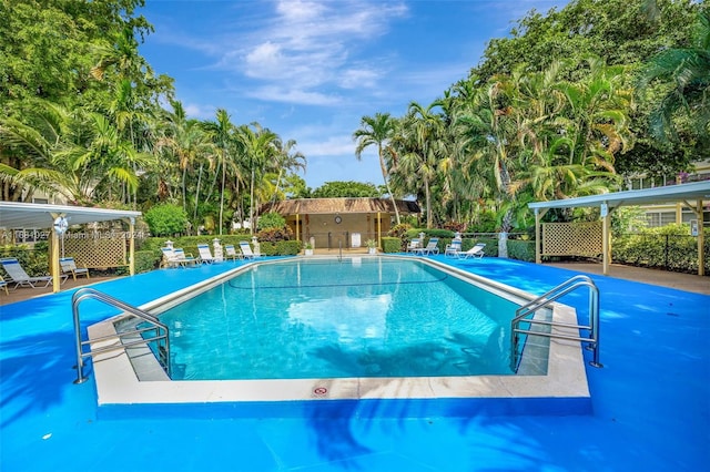 view of swimming pool with a patio area