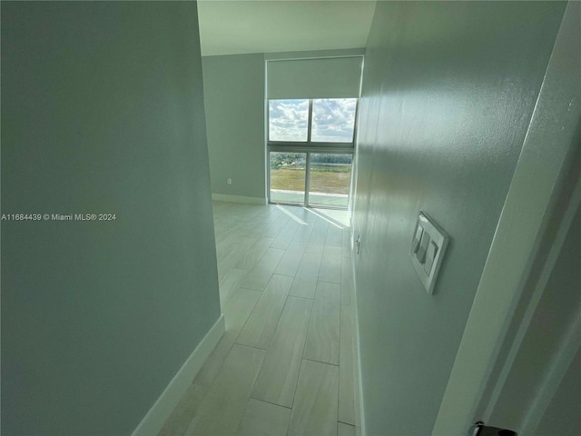 unfurnished room featuring light hardwood / wood-style flooring