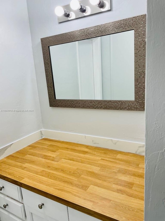 bathroom featuring wood-type flooring