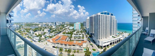 balcony featuring a water view