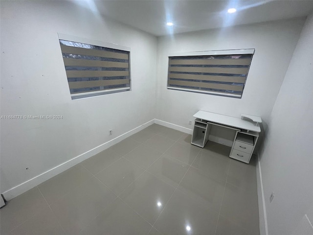 9520 Lisa Rd, Cutler Bay, FL 33157 - unfurnished bedroom with baseboards, tile patterned flooring, and recessed lighting