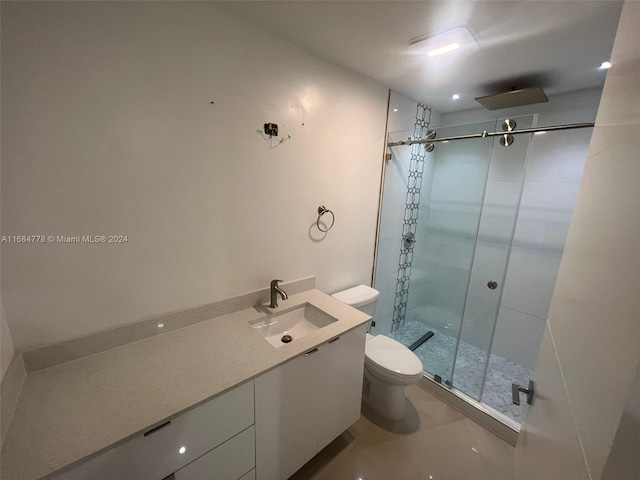 9520 Lisa Rd, Cutler Bay, FL 33157 - bathroom featuring toilet, a stall shower, and a sink