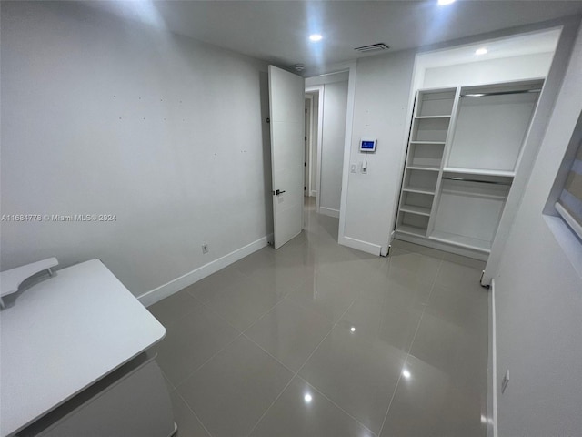 9520 Lisa Rd, Cutler Bay, FL 33157 - unfurnished bedroom with a closet, recessed lighting, baseboards, visible vents, and tile patterned floors