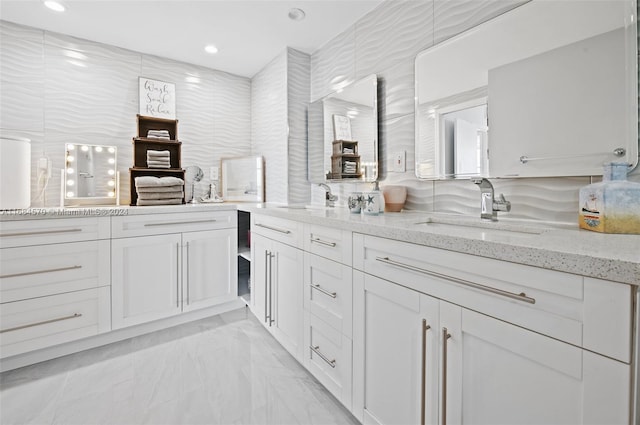 interior space featuring tile walls and vanity