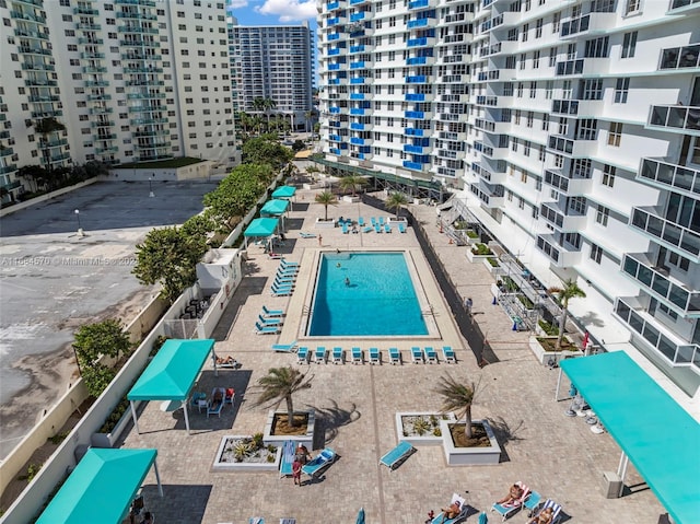 view of swimming pool with a patio area