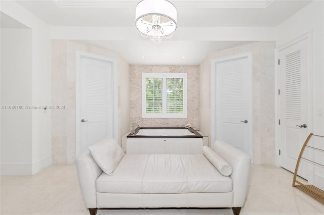 living area featuring an inviting chandelier