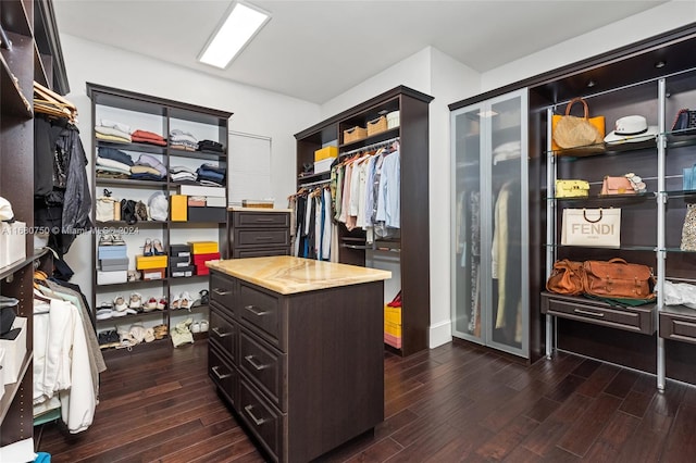 walk in closet featuring dark hardwood / wood-style floors