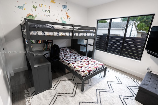 bedroom with light wood-type flooring