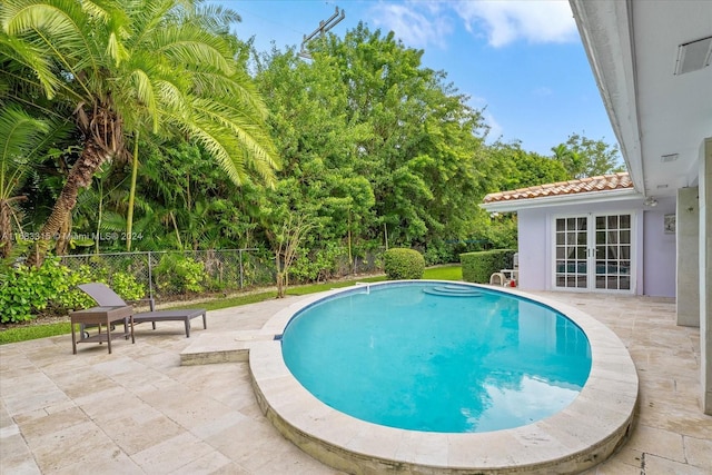 view of pool with a patio area