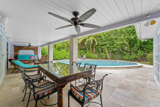 view of patio / terrace featuring ceiling fan