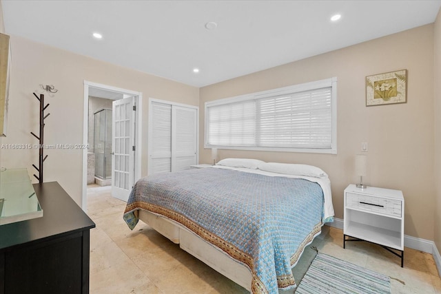 bedroom featuring a closet and ensuite bathroom