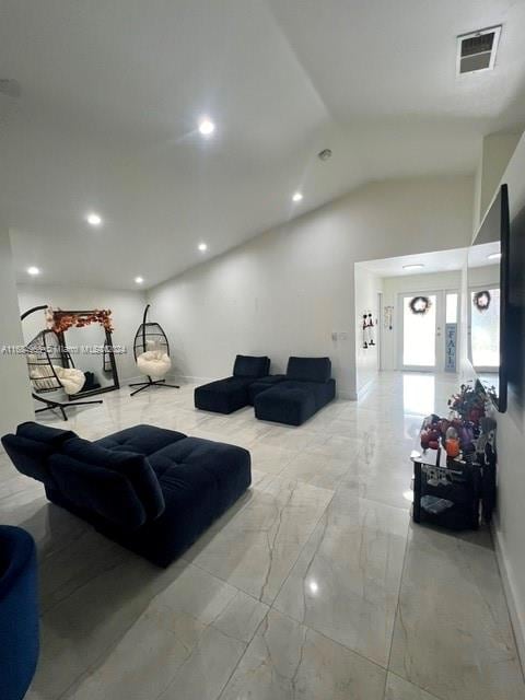 living room with lofted ceiling