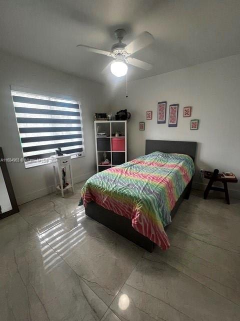 bedroom featuring ceiling fan