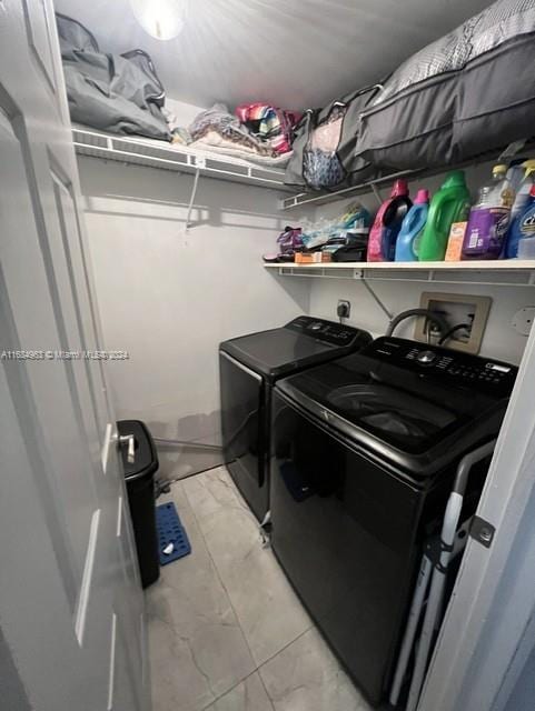 laundry area featuring washer and clothes dryer