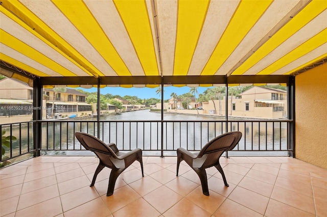 sunroom with a water view