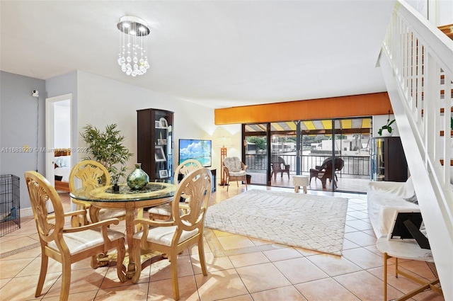 15442 Kippford Ct, Miami Lakes, FL 33014 - dining area with stairs and light tile patterned floors