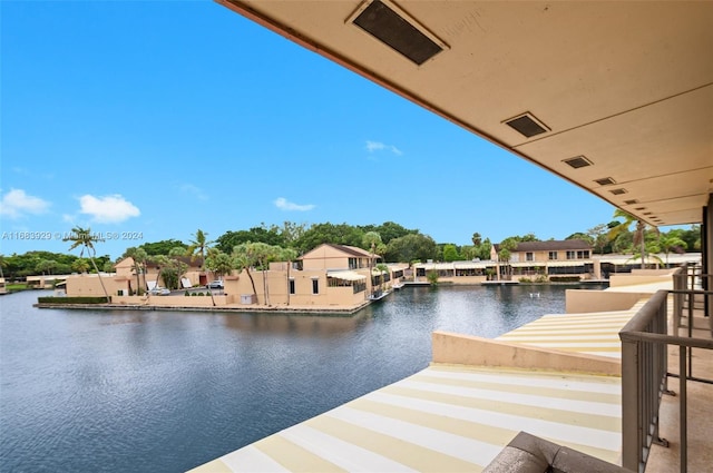 dock area with a water view