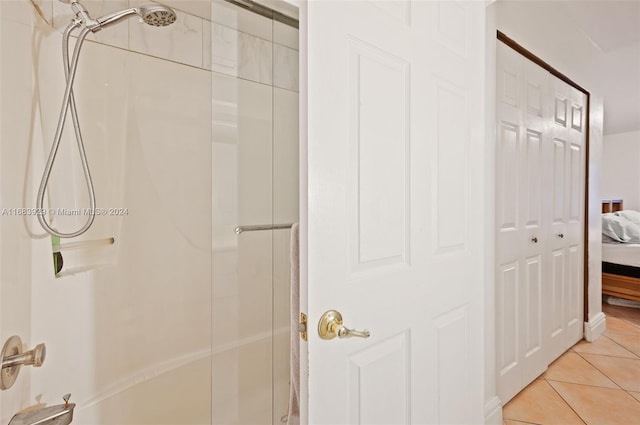 bathroom featuring tile patterned floors and walk in shower