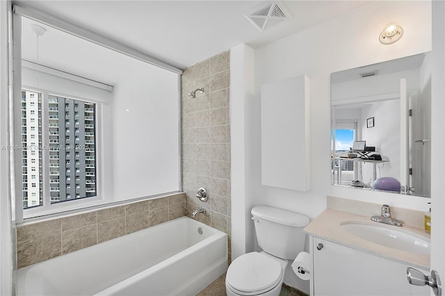 full bath with  shower combination, visible vents, vanity, and toilet