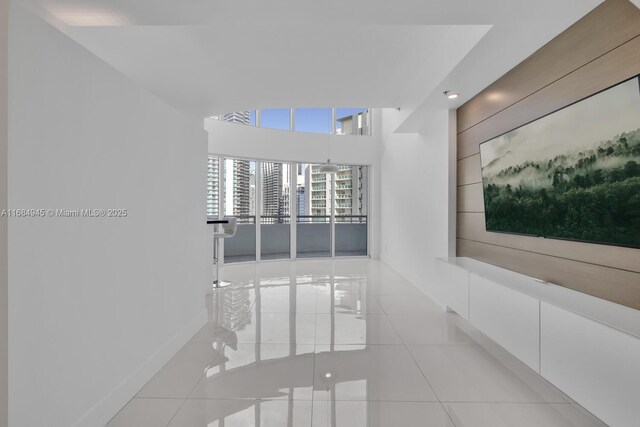 tiled bedroom featuring access to exterior