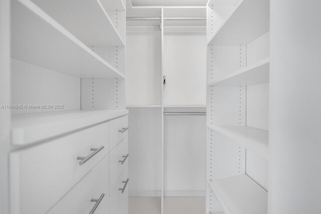 kitchen with white cabinets, appliances with stainless steel finishes, and sink