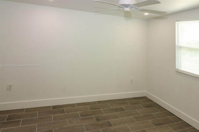 empty room with dark wood-type flooring