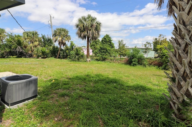 view of yard featuring central AC