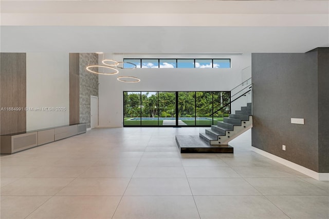 6695 SW 112th St, Pinecrest, FL 33156 - building lobby with a towering ceiling and stairway