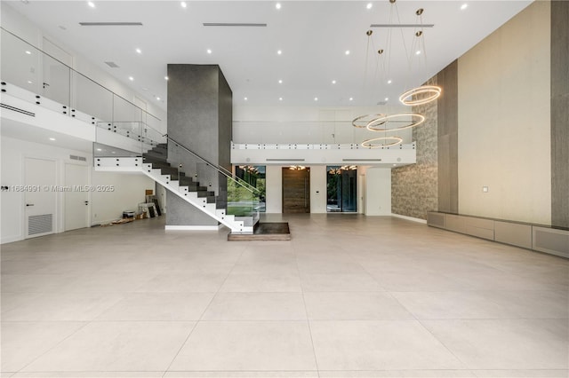 6695 SW 112th St, Pinecrest, FL 33156 - community lobby featuring a high ceiling and stairs
