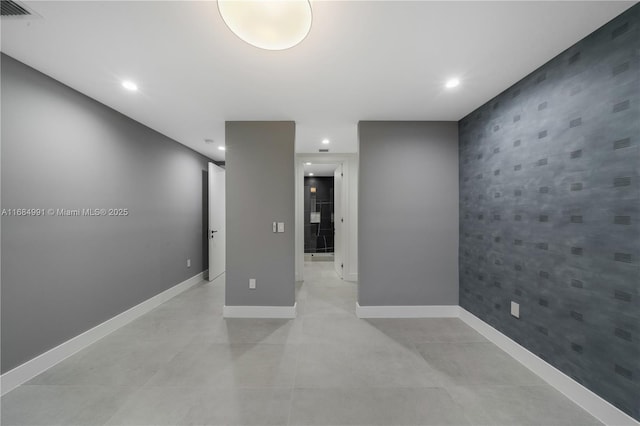 6695 SW 112th St, Pinecrest, FL 33156 - empty room with wallpapered walls, baseboards, recessed lighting, and an accent wall