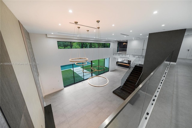 6695 SW 112th St, Pinecrest, FL 33156 - stairway featuring recessed lighting and baseboards