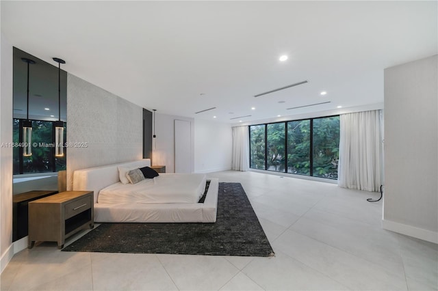 6695 SW 112th St, Pinecrest, FL 33156 - bedroom with baseboards, expansive windows, recessed lighting, and light tile patterned floors