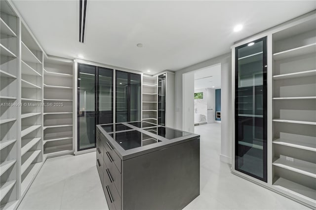 6695 SW 112th St, Pinecrest, FL 33156 - spacious closet with light tile patterned floors